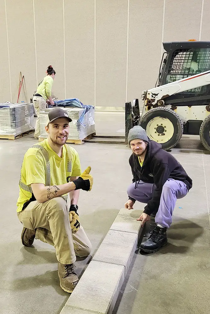 LCI Landscapes team members working on a project.