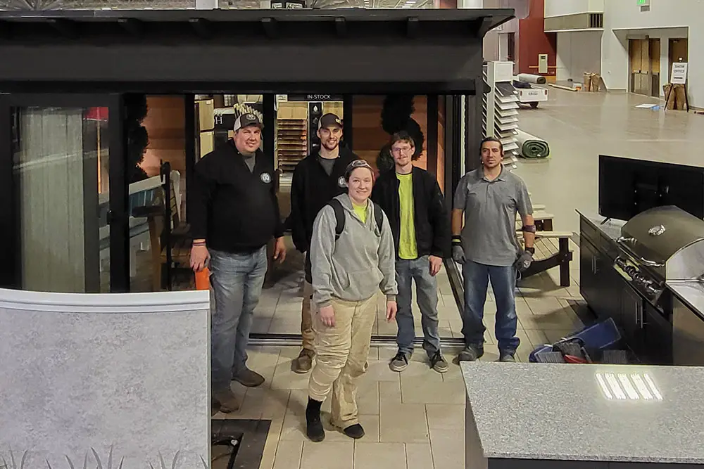 LCI Landscapes team setting up a display.